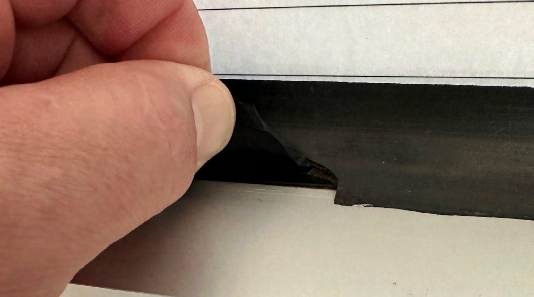 Sealant over the gasket — the “wet glaze” shortcut: Concave bead over the gasket, no bond to the frame.